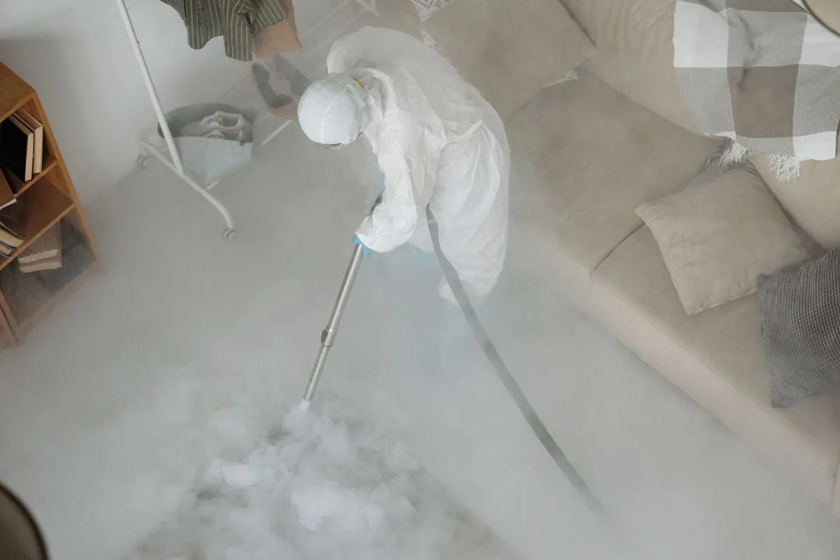 Biohazard cleanup technician in protective equipment, Caballo Hills, Oakland, CA